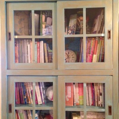 Here's my library cabinet.  I have books organized in categories.  It's actually three tiers in height, but I could only fit part of it into the picture.